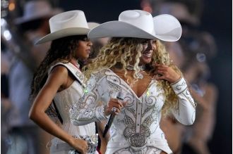 Beyoncé debuts 'Cowboy Carter' songs at NFL Christmas game in first live performance.