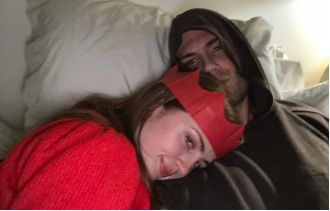 The singer Max George embraces Maisie Smith when he arrives home for the holidays.