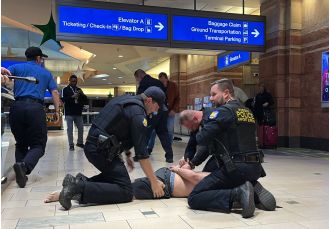 Four people injured in violent attack at airport during busy travel day