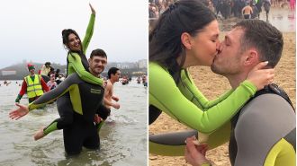A former Royal Marine surprises his girlfriend by proposing to her during a Boxing Day swim.
