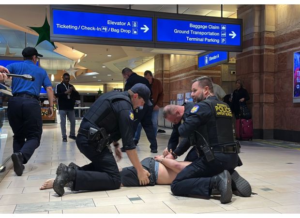 Four people injured in violent attack at airport during busy travel day