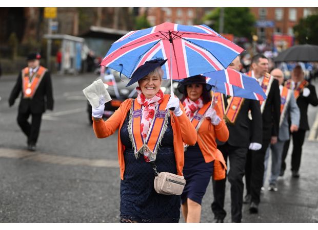 Did Queen Elizabeth describe the Orange marches as foolish activities?