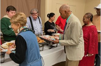 75 people attended the Christmas day celebration at La Grange church for the Greatest Gift event.