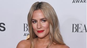 Friends of Caroline Flack defend her against her mother's hurtful inquiries.