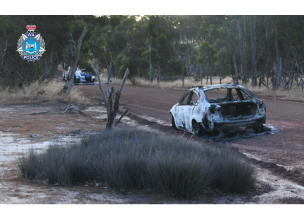 A woman is accused of murder after a man's body was discovered in a car that had been set on fire in Western Australia.
