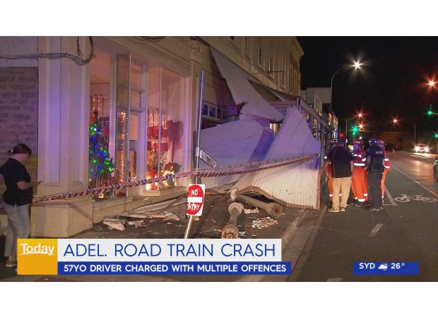 Truck driver arrested for damaging posts and parked cars with road train.