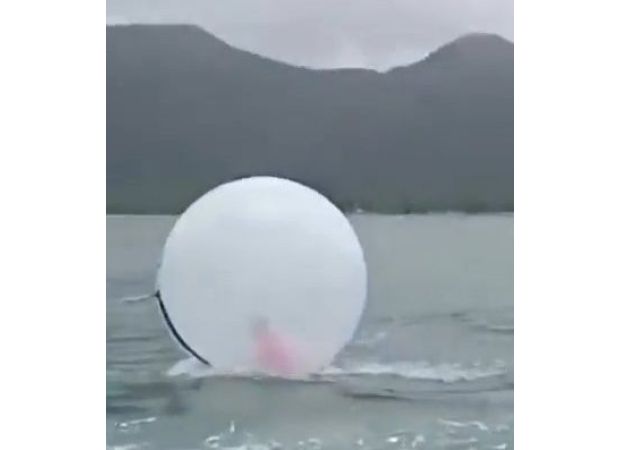 8-year-old boy rescued from the ocean in an inflatable bubble.
