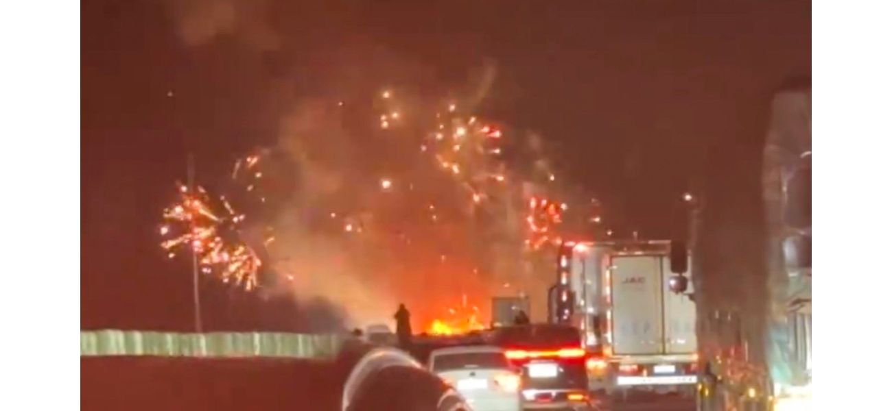 Truck with fireworks crashes and causes amazing highway show.