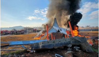 Dozens killed in South Korea plane accident, two people survive.