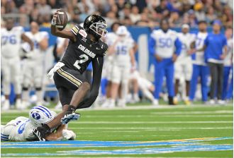 The CU Buffs lost to BYU 36-14 in the Alamo Bowl, as seen in photos.