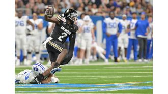 The CU Buffs lost to BYU 36-14 in the Alamo Bowl, as seen in photos.