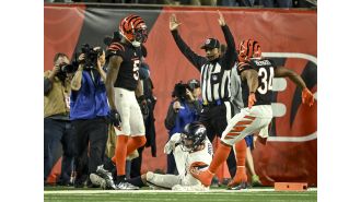 Denver's chances for the playoffs are uncertain as their coach's decision to play for overtime backfired in a 30-24 defeat against Cincinnati.