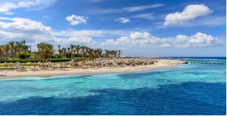 A shark attack at a beach resort resulted in the death of a tourist and injury of another.