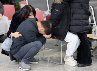 Sorrow for South Korea plane crash victims: 'Family gone without a trace.'