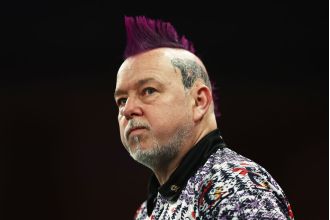 Peter Wright beats Luke Humphries to advance in World Darts Championship.
