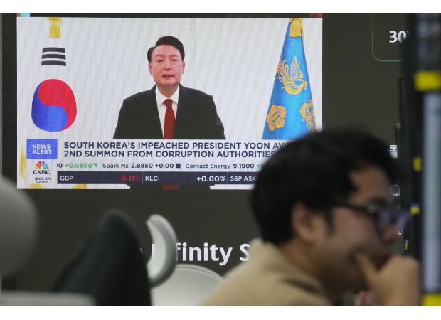 South Korea wants to arrest impeached President Yoon Suk Yeol during investigation into potential martial law violations.