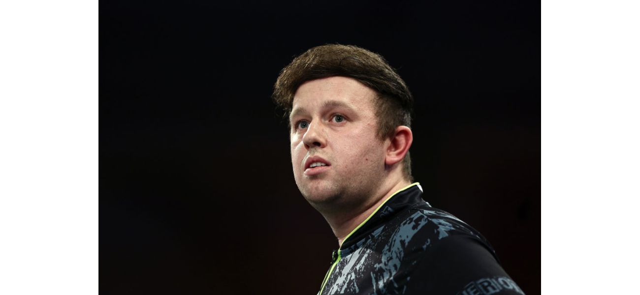 Rydz pokes fun at his hair during World Darts Championship, amusing fans.