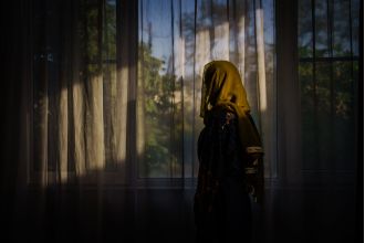 The Taliban forbids women from being visible in nearby houses.