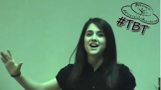 14-year-old Ariana Grande looks completely different as she sings a song from Wicked.