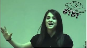 14-year-old Ariana Grande looks completely different as she sings a song from Wicked.