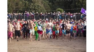 The science of Boxing Day and New Year's dips that keeps people coming back.