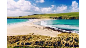 An island 100 miles from the mainland that is known for its stunning beauty and desirable living conditions.