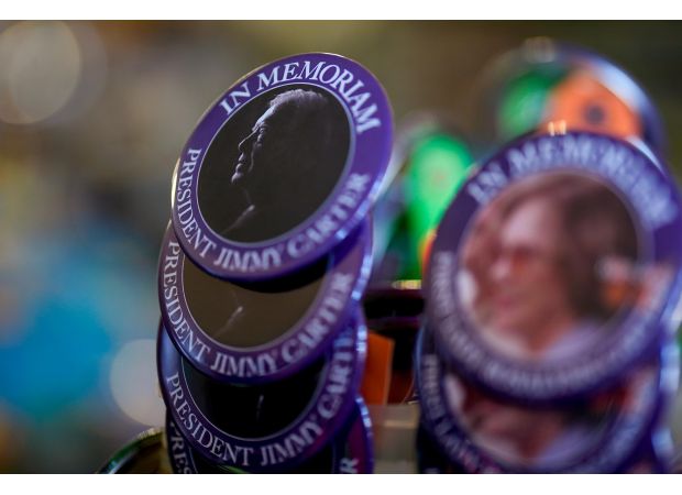 The passing of Jimmy Carter is being grieved in his small hometown and internationally.