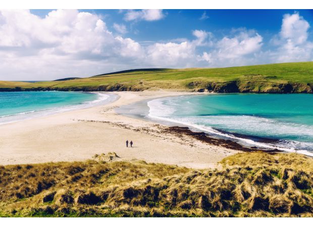 An island 100 miles from the mainland that is known for its stunning beauty and desirable living conditions.