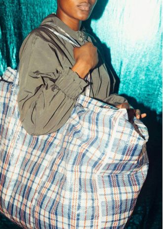 A baby girl was left in a bag outside a house in the Bronx, and authorities are searching for her mother.