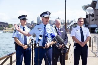 Violence and detentions overshadow Sydney's New Year's Eve festivities.