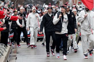 Despite challenges from the Blackhawks and bad weather, fans remain excited for the upcoming Wrigley hockey game.