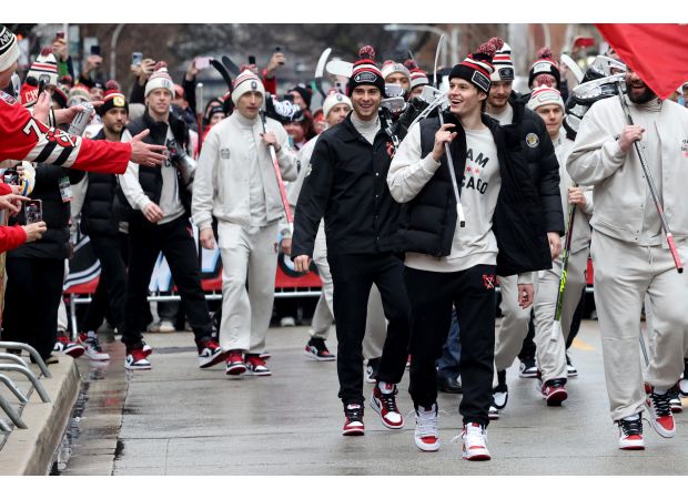 Despite challenges from the Blackhawks and bad weather, fans remain excited for the upcoming Wrigley hockey game.