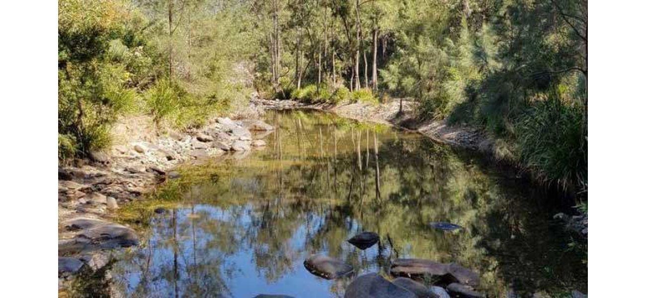 A woman who fell from a river tube near Brisbane has been discovered deceased.