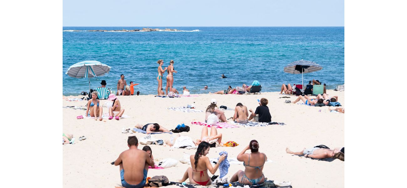 Australia has a mix of sunny and stormy weather while many people take advantage of a holiday.