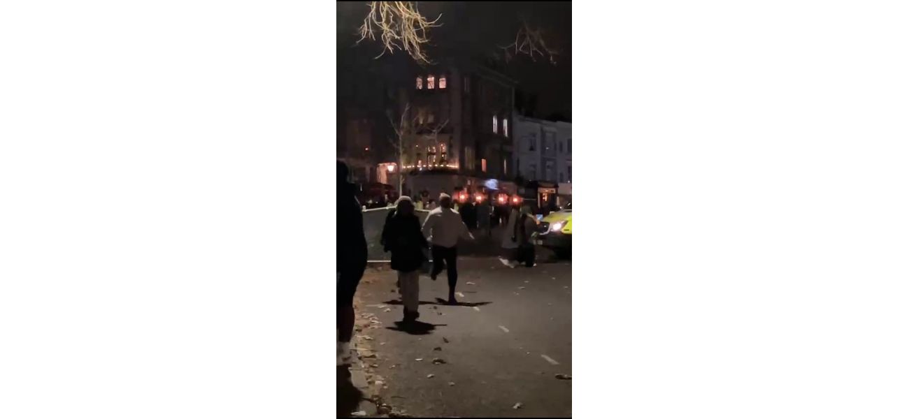 A man was taken into custody after his car veered into a group of people who were ringing in the New Year.