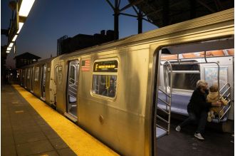 A woman who died in a fire on a New York City subway has been identified.