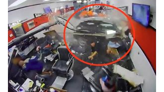A 10-year-old boy was injured when an SUV drove into a barber shop.