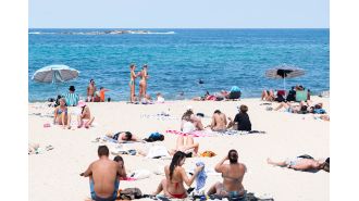Australia has a mix of sunny and stormy weather while many people take advantage of a holiday.