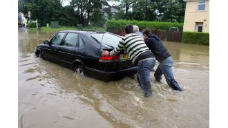 Severe floods cause significant travel disruptions on major roads and trains as the new year begins.