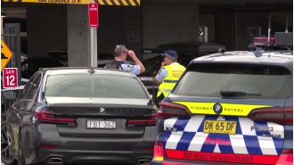 A man in his 30s was killed by police in a car park at a hospital in New South Wales.
