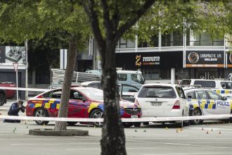 A driver in New Zealand fatally strikes two police officers, leaving one dead.