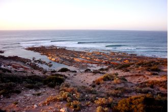 Concerns arise about potential shark attack when a surfer goes missing in the water.