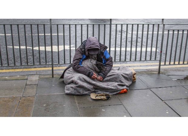 Assist a homeless person following severe cold health alert