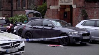 A man yelled racist insults at a steward before driving into a crowd on New Year's Eve.
