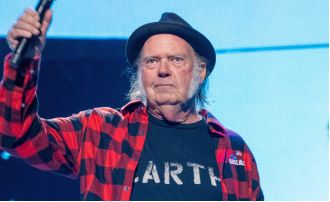 Neil Young has reversed his decision to not play at Glastonbury, citing an error that caused him to drop out initially.