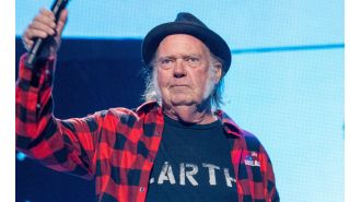 Neil Young has reversed his decision to not play at Glastonbury, citing an error that caused him to drop out initially.