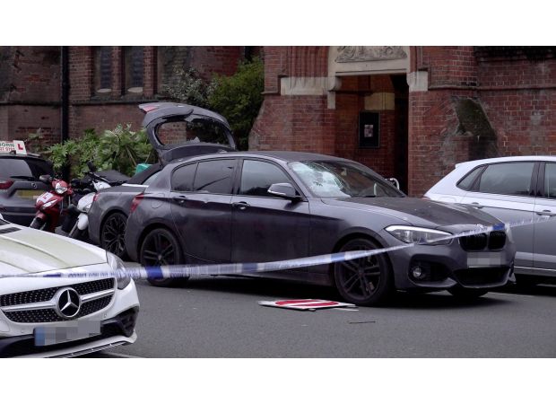 A man yelled racist insults at a steward before driving into a crowd on New Year's Eve.