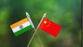 India promises to safeguard its interests in response to China's plan for a dam on the Brahmaputra river.