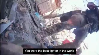 Video shows Ukrainian and Russian soldiers engaged in deadly knife fight.
