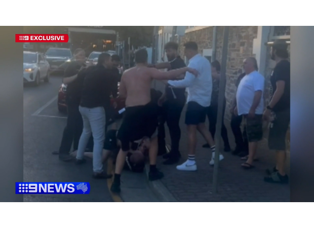 Three people have been charged following a violent fight at a beach in Adelaide.